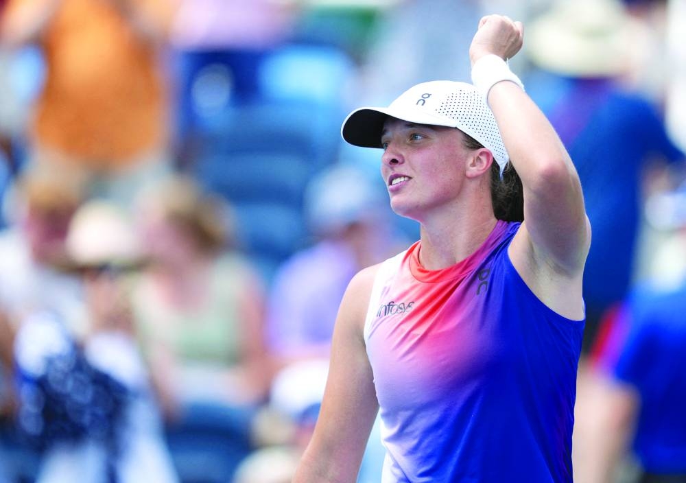 Iga Swiatek of Poland celebrates winning her match against Mirra Andreeva on day six of the Cincinnati Open. Mandatory Credit: Susan Mullane-USA TODAY Sports/File Photo