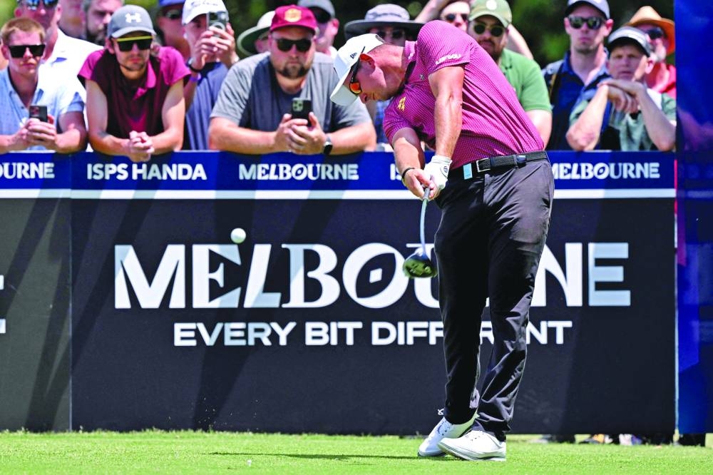 Lucas Herbert of Australia tees off during the second round of the 2024 Australian Open at the Kingston Heath Golf Club in Melbourne on Friday. (AFP)