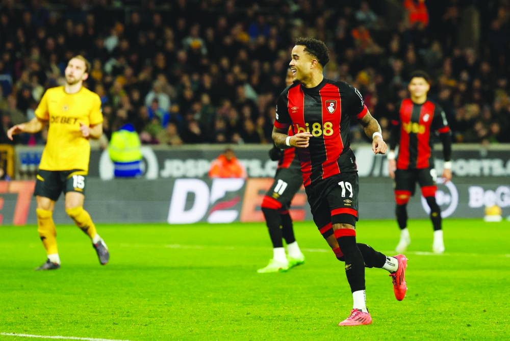 
Bournemouth’s Justin Kluivert (right) celebrates his hat-trick against Wolverhampton Wanderers yesterday. (Reuters) 