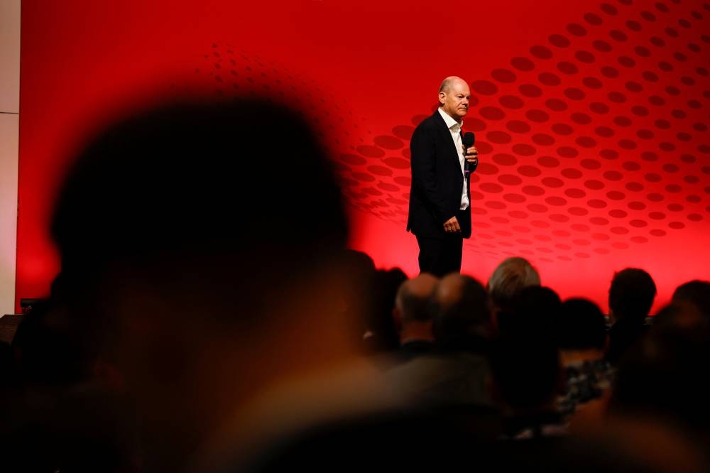 SPOTLIGHT: German Chancellor Olaf Scholz speaks at a municipal congress, organised by DEMO, a social democratic magazine for local politics, in his first appearance following his return to Germany after the G20 Summit, in Berlin, last Friday. (Reuters) 