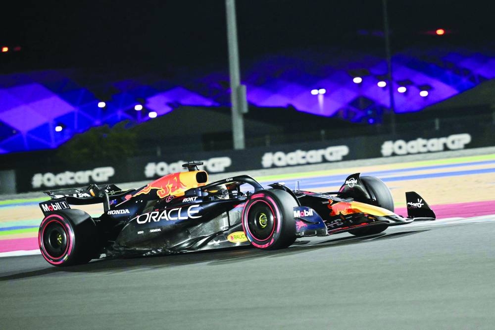
Red Bull’s Max Verstappen (also left) drives during the qualifying session of the Qatar Grand Prix at Lusail International Circuit. (AFP) 