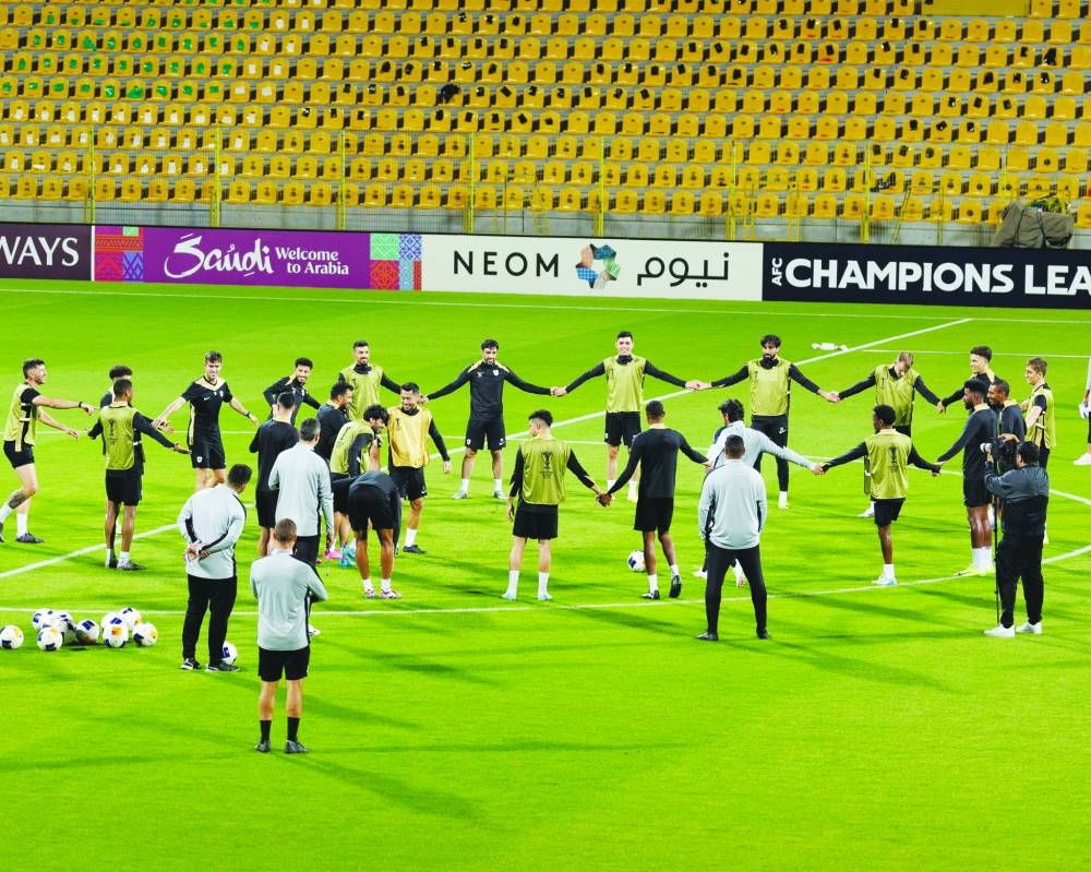 
Al Rayyan players and backroom staff members during team training session in Al Wasl, UAE, yesterday. Qatar football side Al Rayyan face Al Wasl today. 