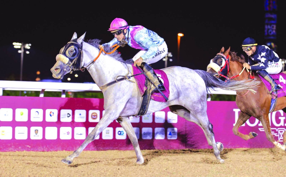 Jockey Szczepan Mazur guides Roma to Zekreet Cup win on Wednesday. PICTURE: Juhaim