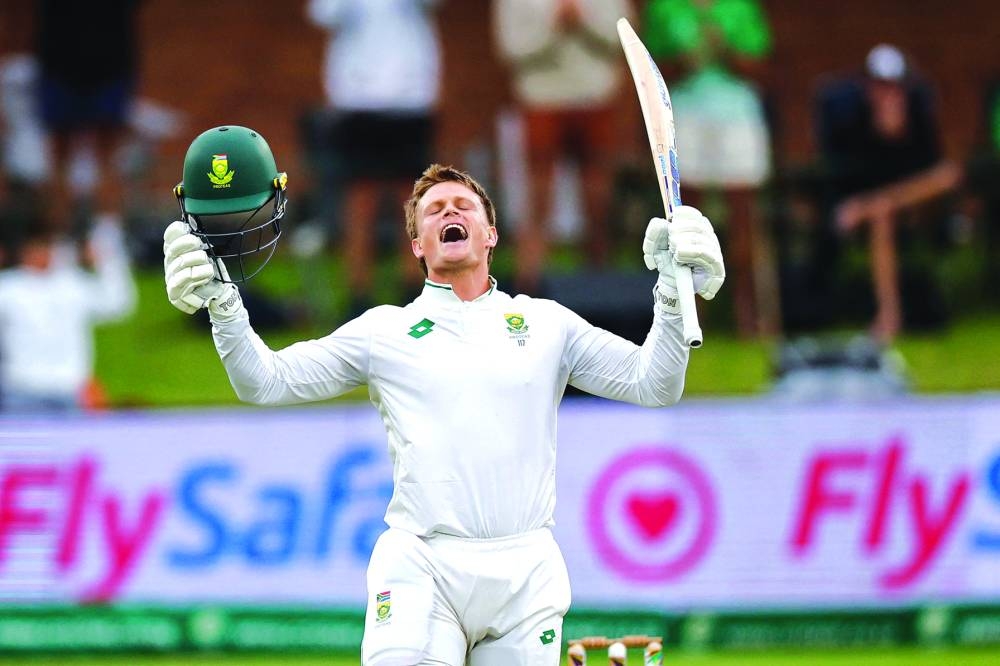 South Africa’s Ryan Rickelton celebrates after scoring a century during the first day of the second Test against Sri Lanka at St Georges Park in Gqeberha on Thursday. (AFP)
