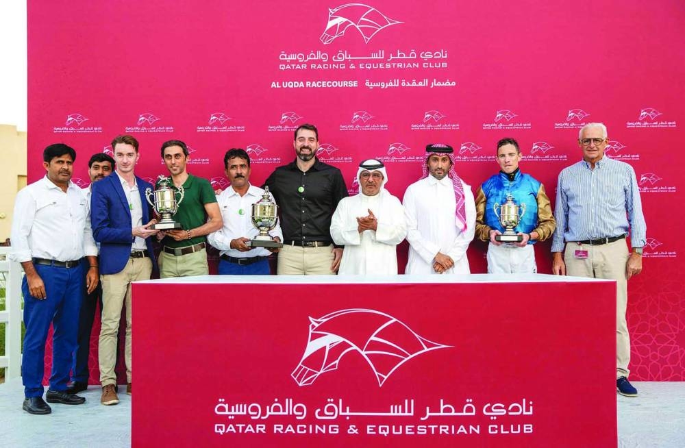 Connections of Supercooled celebrate after the colt won the Thoroughbred Derby Trial at the Al Uqda Racecourse on Thursday. PICTURES: Juhaim