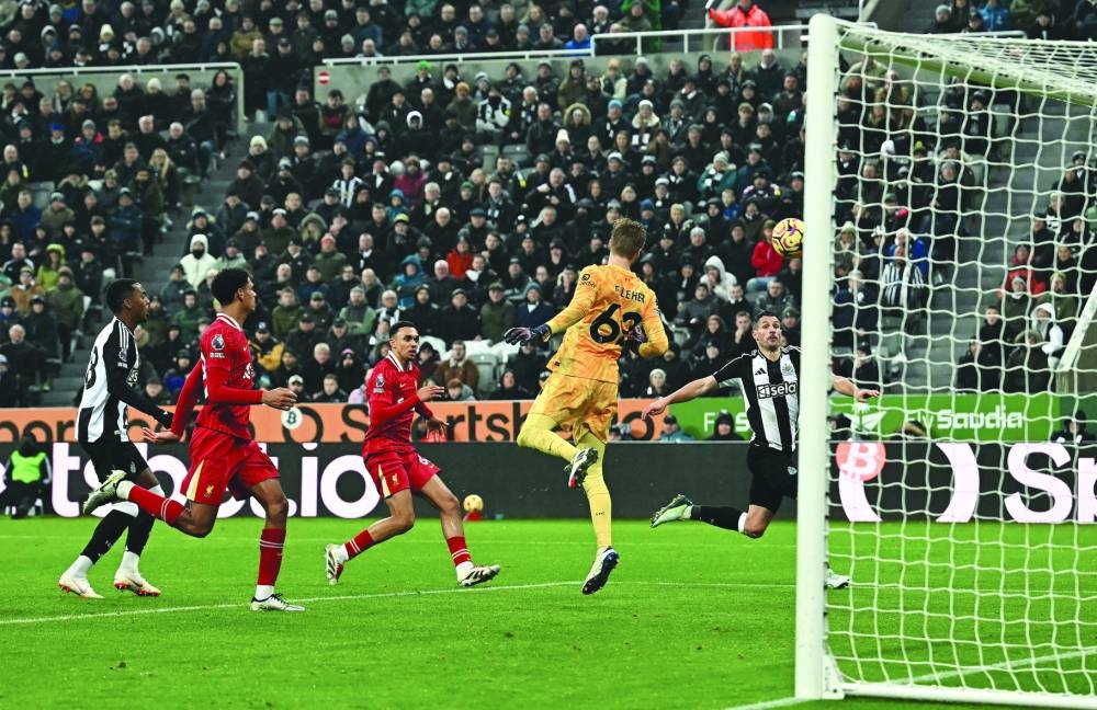 
Newcastle United’s Fabian Schar (right) scores against Liverpool during the Premier League match at St James’ Park. (AFP) 