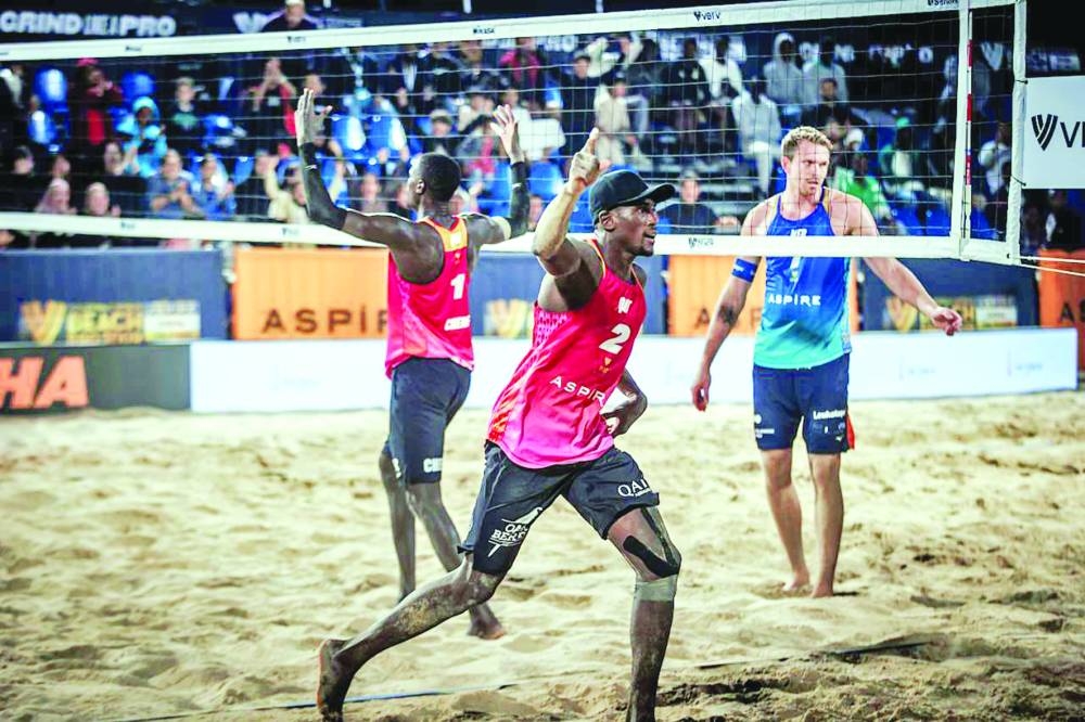 
Qatar’s Cherif Younousse and Ahmed Tijan celebrate after their win over the Netherlands’ Stefan Boermans and Yorick de Groot at Aspire Zone. 