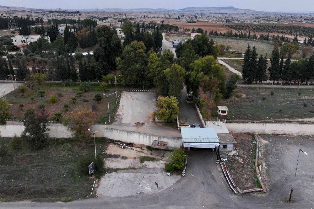 An aerial view of the Syrian regime's Political Security Branch on the outskirts of the Hama governorate after anti-government forces took control of the area, on Saturday. AFP