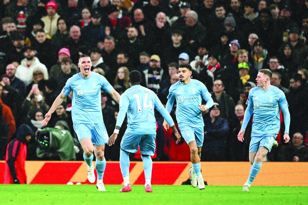 
Nottingham Forest’s Nikola Milenkovic (keft) celebrates after scoring against Manchester United during the Premier League match at Old Trafford in Manchester. (AFP) 