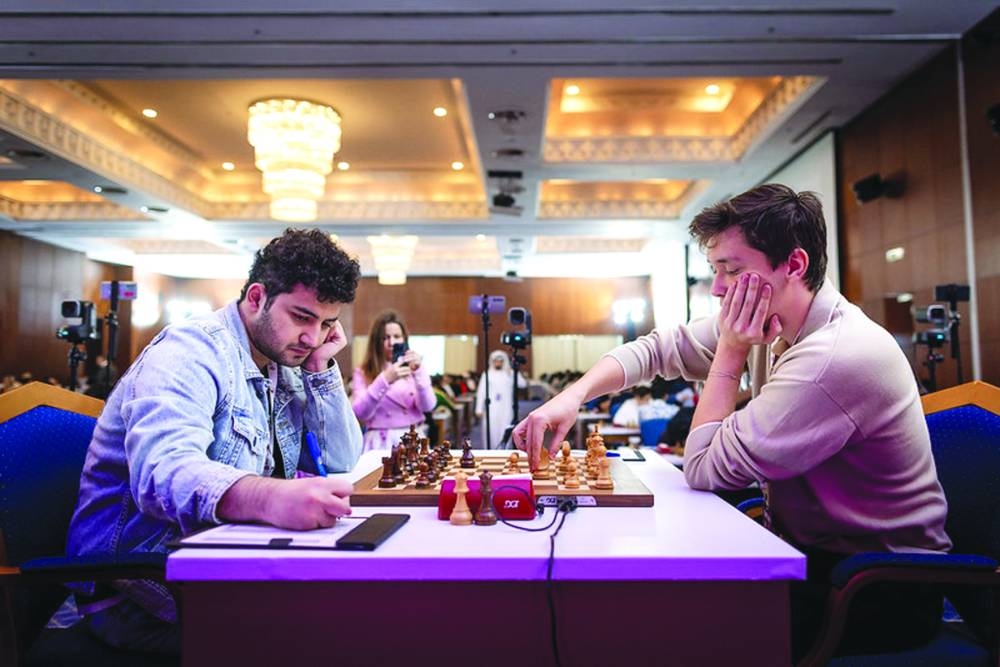 Russia’s sixth seed Andrey Esipenko (right) drew with Iran’s Bardiya Daneshvar, bringing both players to four points.