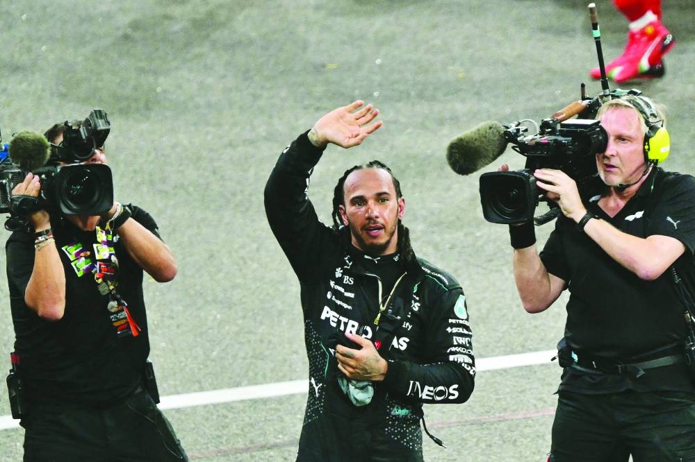 
Mercedes’ British driver Lewis Hamilton greets the fans after the Abu Dhabi Grand Prix. (Reuters) 