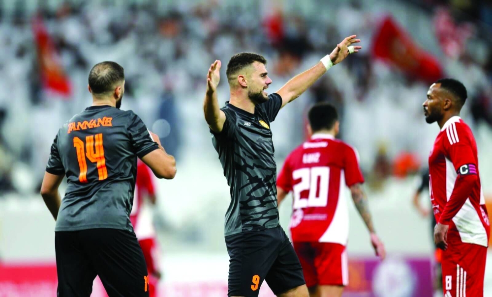 Umm Salal’s Antonio Mance celebrates after scoring against Al Arabi yesterday.