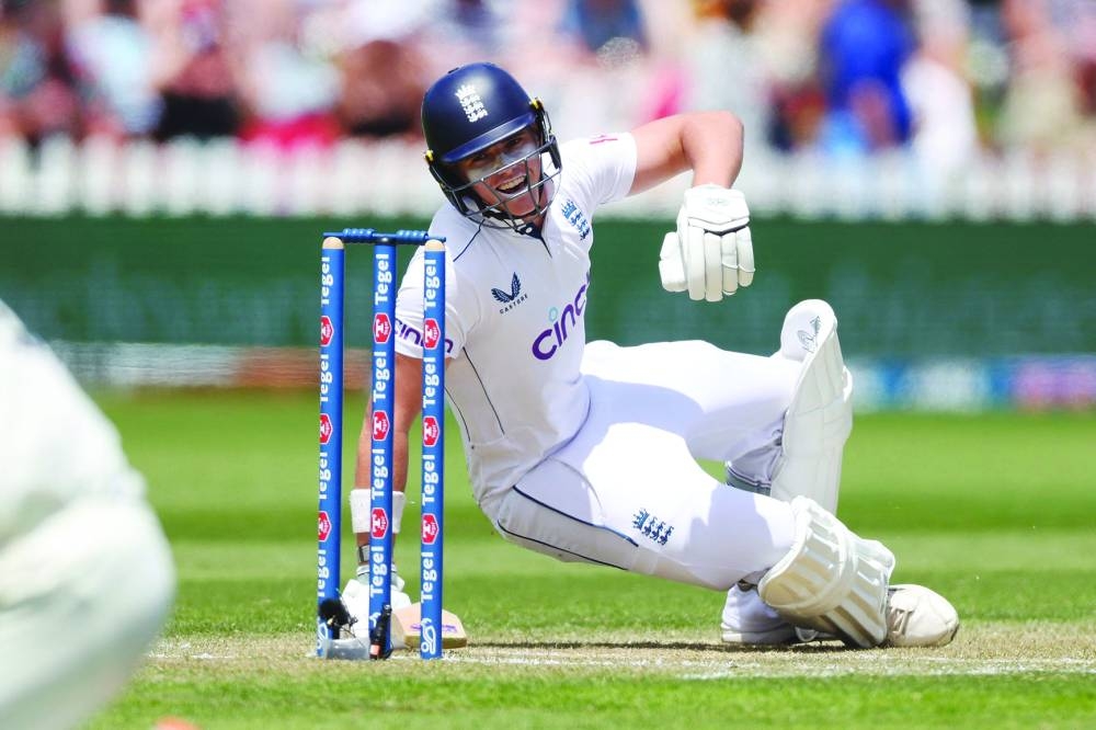 
England’s Jacob Bethell falls over on day two of the second Test against New Zealand at the Basin Reserve in Wellington on Saturday. (AFP) 