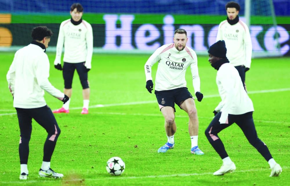 
Paris Saint-Germain’s Milan Skriniar (centre) trains with teammates in Salzburg, Austria. (AFP) 