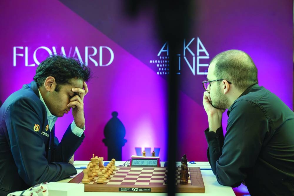 
India’s Arjun Erigaisi (left) ponders his next move against Russia’s David Paravyan. 