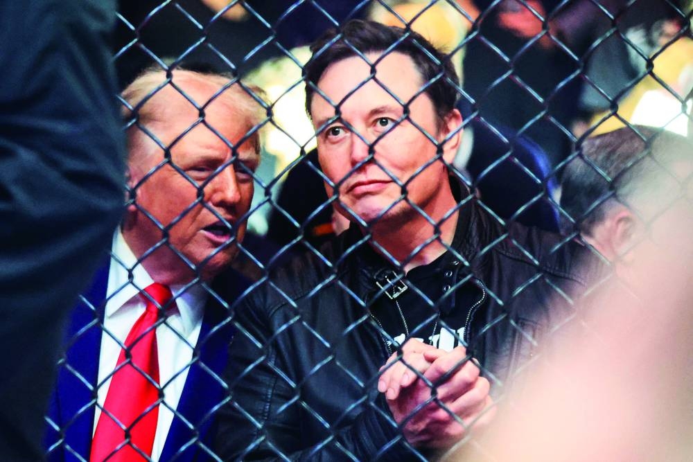 
US President-elect Donald Trump (left) and Tesla and SpaceX CEO Elon Musk watch a fight during UFC 309 at Madison Square Garden in New York last month. (AFP) 