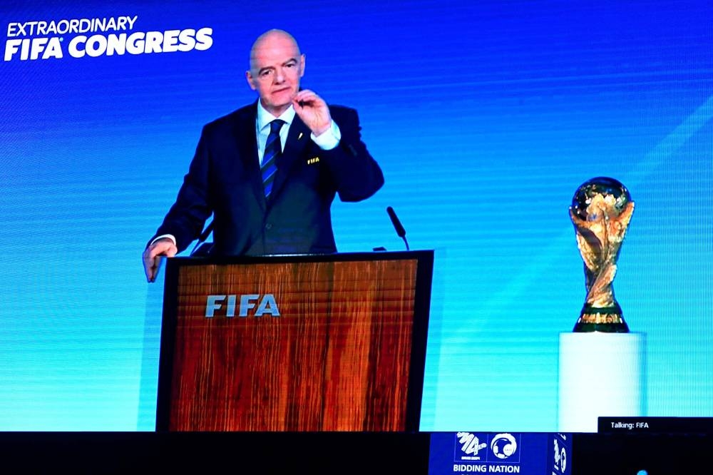 A speech by President of FIFA Gianni Infantino is broadcasted on a screen during a ceremony in the capital Riyadh on Wednesday, as the FIFA Congress votes for the hosting rights for the 2034 World Cup with Saudi Arabia being the sole candidate. AFP