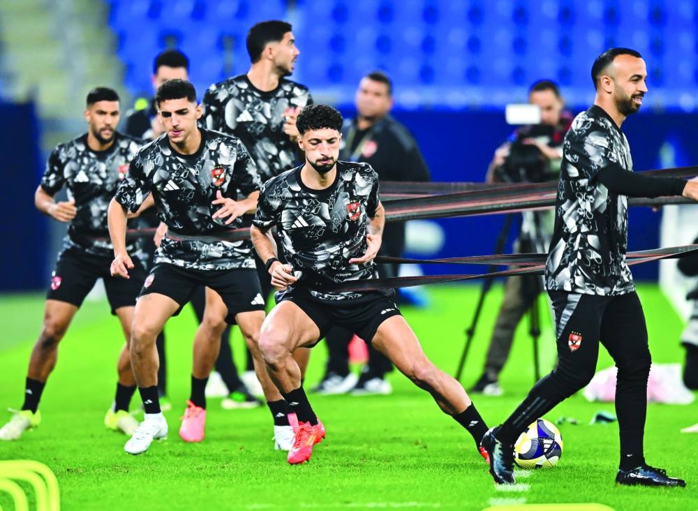 Al Ahly and Pachuca (below) players train at the Stadium 974 on Friday, on the eve of their FIFA Challenger Cup match.