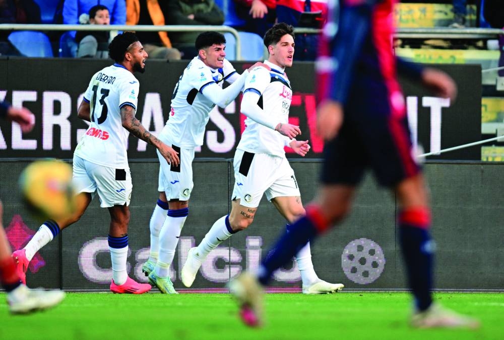 
Atalanta’s Nicolo Zaniolo (right) celebrates with teammates after scoring against Cagliari in the Serie A. (Reuters) 