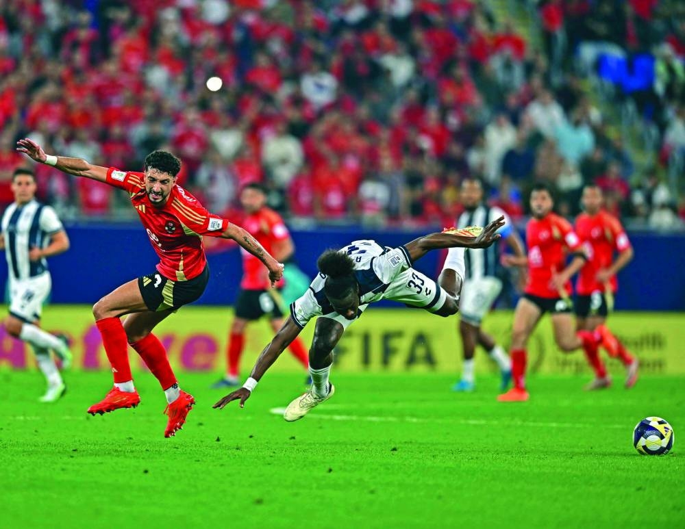Wessam Abou Ali (left) of Al Ahly and Andres Micolta of Pachuca vie for the ball at the 974 Stadium on Saturday. PICTURES: Noushad Thekkayil