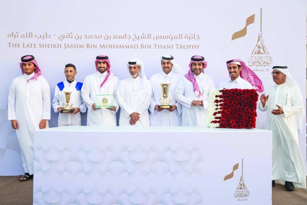 Minister of Sports & Youth HE Sheikh Hamad bin Khalifa bin Ahmed al-Thani presented the trophies to connections of Al Sij Al Sakab, which won The Late Sheikh Jassim Bin Mohammad Bin Thani Trophy at the Qatar Racing and Equestrian Club’s Al Uqda Racecourse on Saturday. QREC Chairman Issa bin Mohammed al-Mohannadi was also present on the occasion.