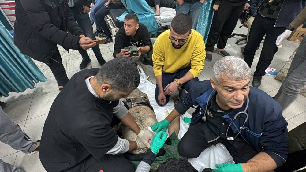 A wounded Palestinian is assisted at Kamal Adwan hospital, during the ongoing Israeli military operation, in Beit Lahiya, in the northern Gaza Strip, on Tuesday. REUTERS