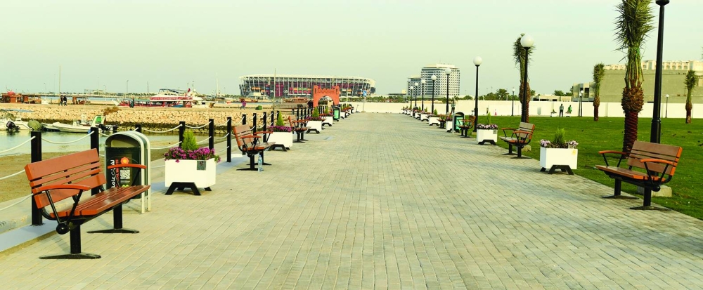 Stadium 974 is seen in the backdrop of Ras Al Nasaa Park on Doha Corniche