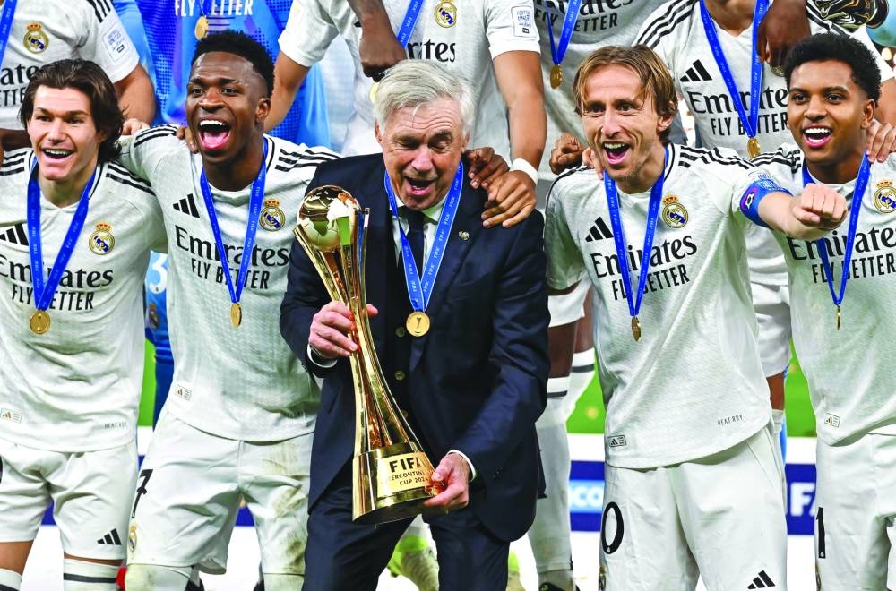 Carlo Ancelotti (centre) became the most decorated coach in Real Madrid’s history with his 15th title, surpassing the 14 trophies won by Miguel Munoz, who managed the Spanish powerhouse in the 1960s and ’70s. PICTURE: Noushad Thekkayil