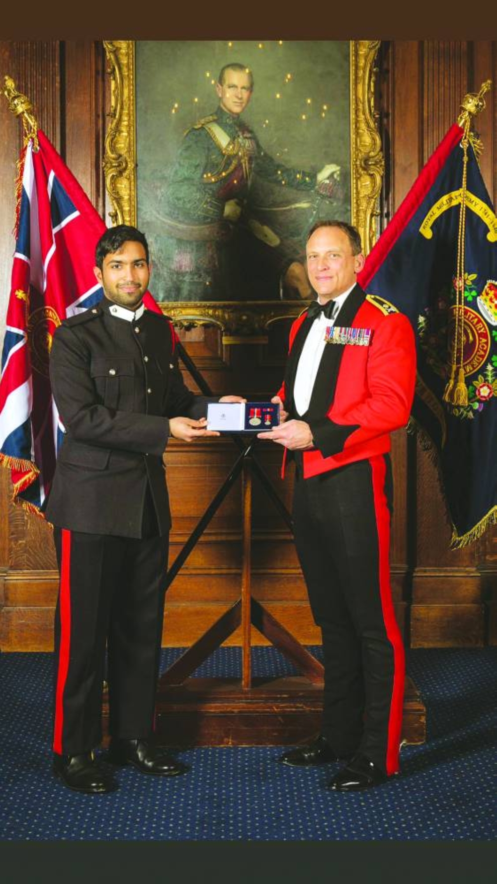 Ahmad al-Kuwari receiving an honour.