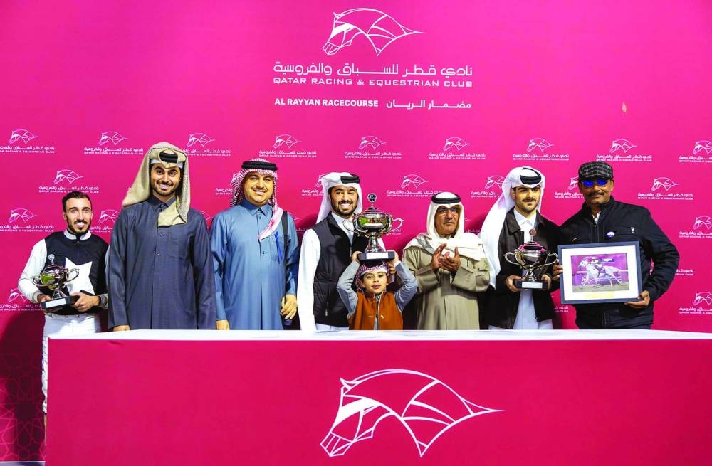 Connections of Mared Al Jasra celebrate after the colt won the Muaither Cup on Thursday. PICTURES: Juhaim