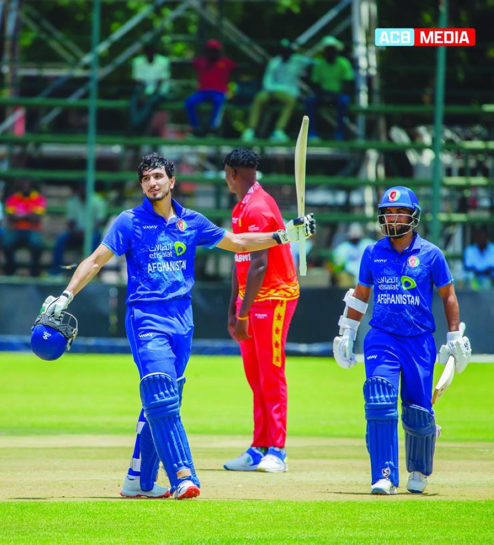 
Afghanistan’s Sediqullah Atal celebrates his century against Zimbabwe.  