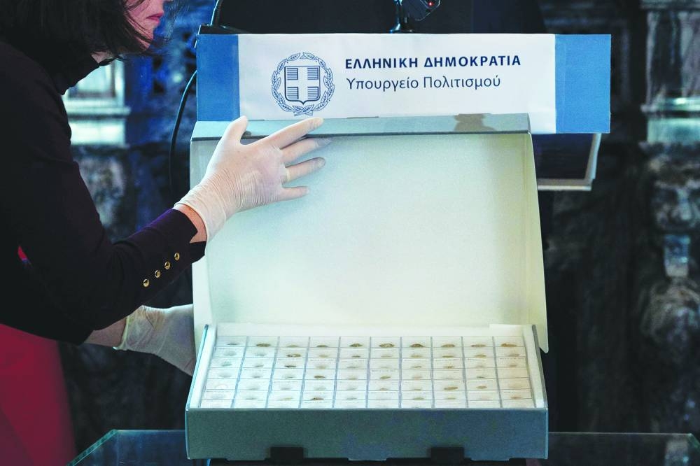 
These photographs show some of the stolen ancient coins that Greece returned to Turkiye in the first repatriation of its kind between the historic rivals and neighbours, at the Numismatic Museum in Athens. (AFP) 
