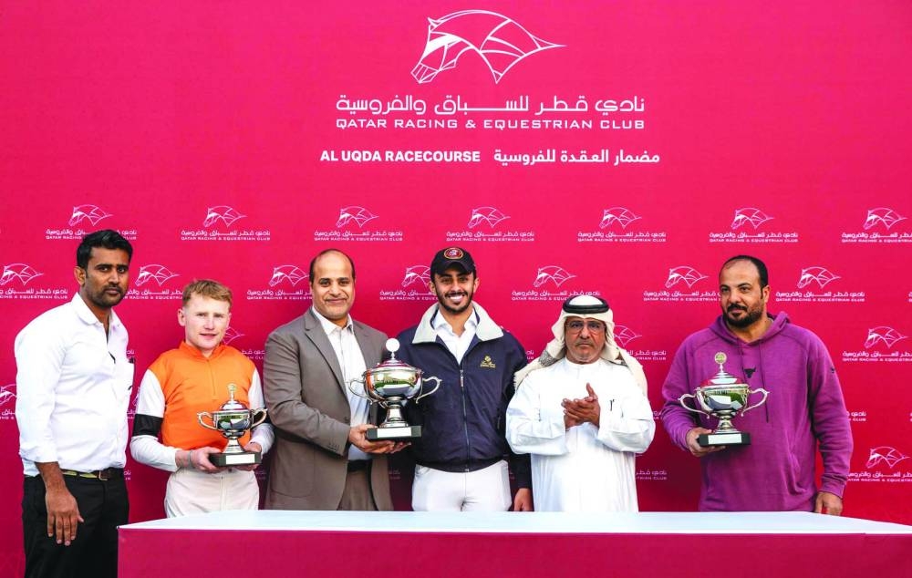 Team of Kerindia celebrates after the filly won the Sawda Natheel Stakes Cup on Saturday. PICTURES: Juhaim