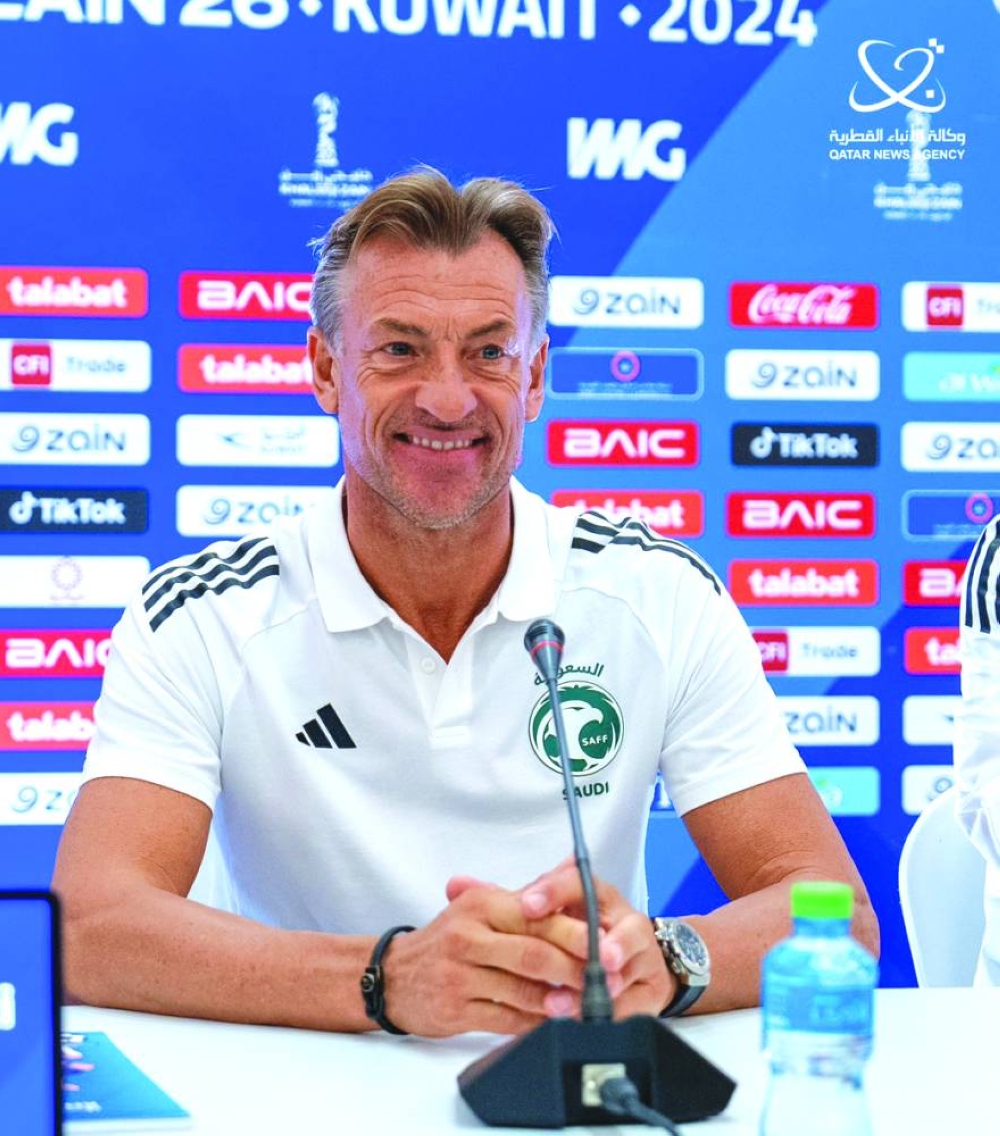Sauid Arabia’s coach Herve Renard and Bahrain’s coach Dragan Talajic (right) address the media on Saturday in Kuwait City.