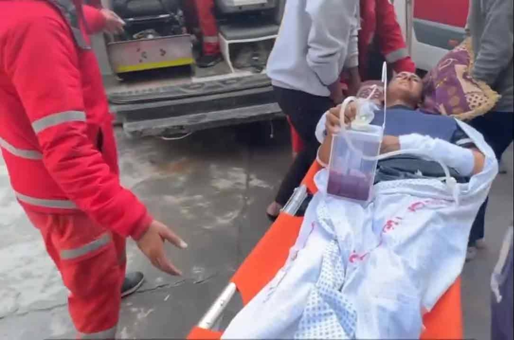 Scenes from around and inside Kamal Adwan hospital.