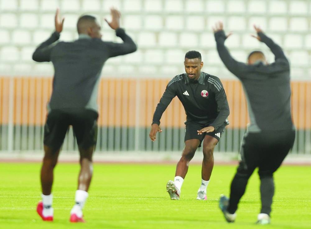 
Qatar forward Mohammed Muntari trains with teammates in Kuwait City yesterday. 