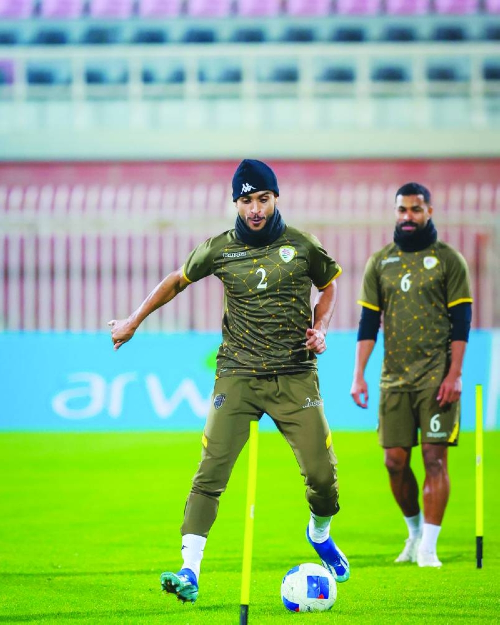 
Oman players train yesterday, on the eve of their match against Qatar. 