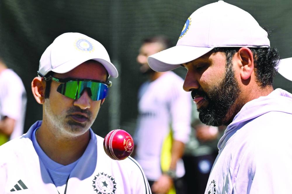 
India’s coach Gautam Gambhir (left) and captain Rohit Sharma chat in the nets at the Melbourne Cricket Ground ahead of the fourth Test starting tomorrow. (AFP) 