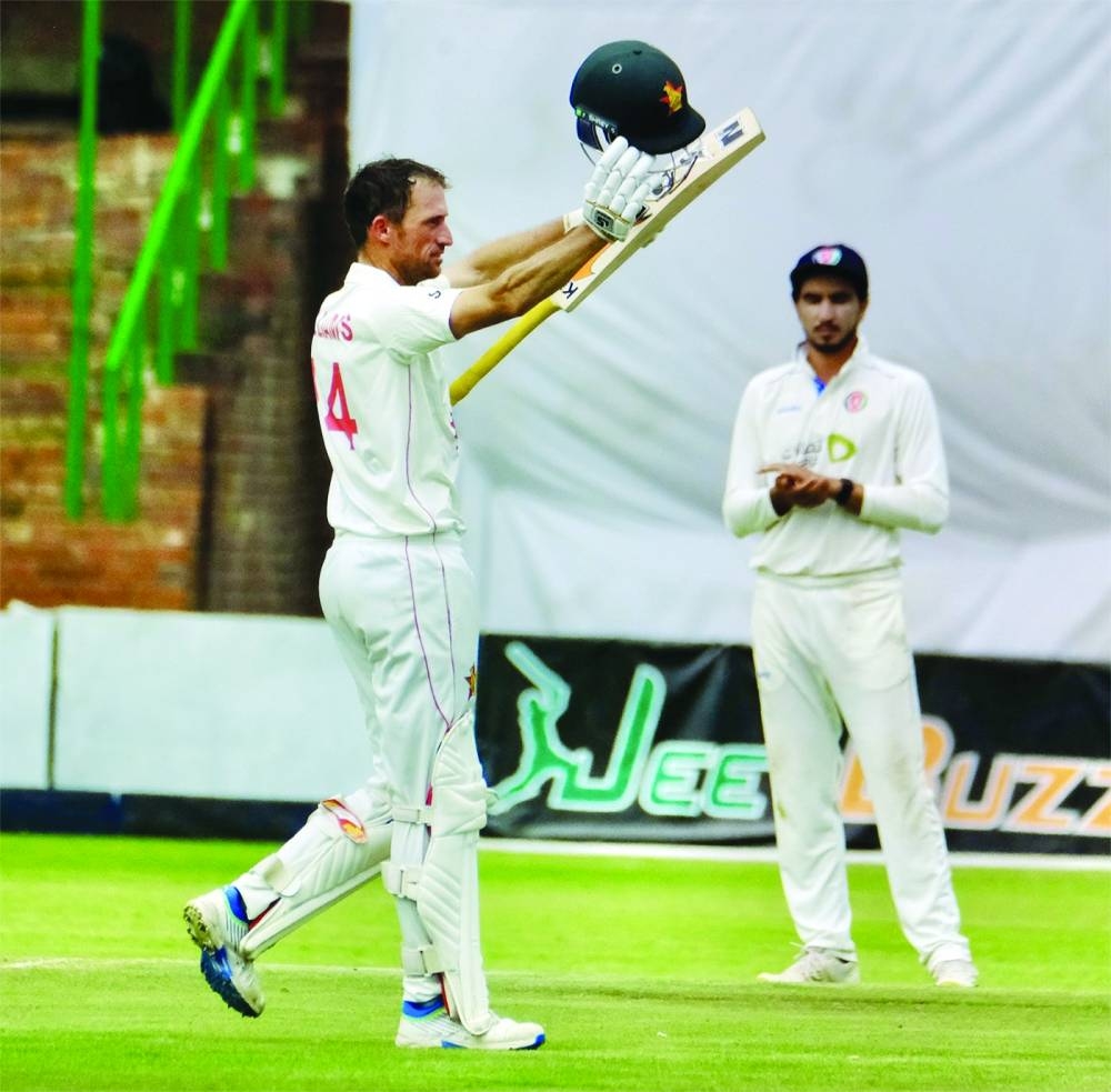 
Sean Williams of Zimbabawe celebrates his century against Afghanistan. 