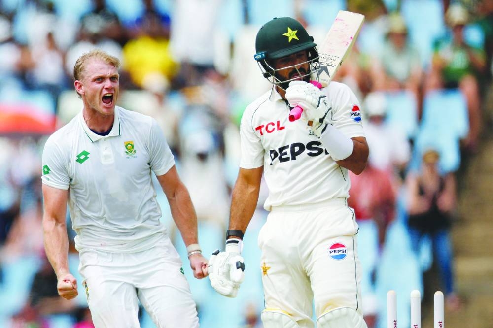 South Africa’s Corbin Bosch (left) celebrates after the dismissal of Pakistan’s Aamer Jamal (right) during the first day of the first Test at SuperSport Park in Centurion on Thursday. (AFP)