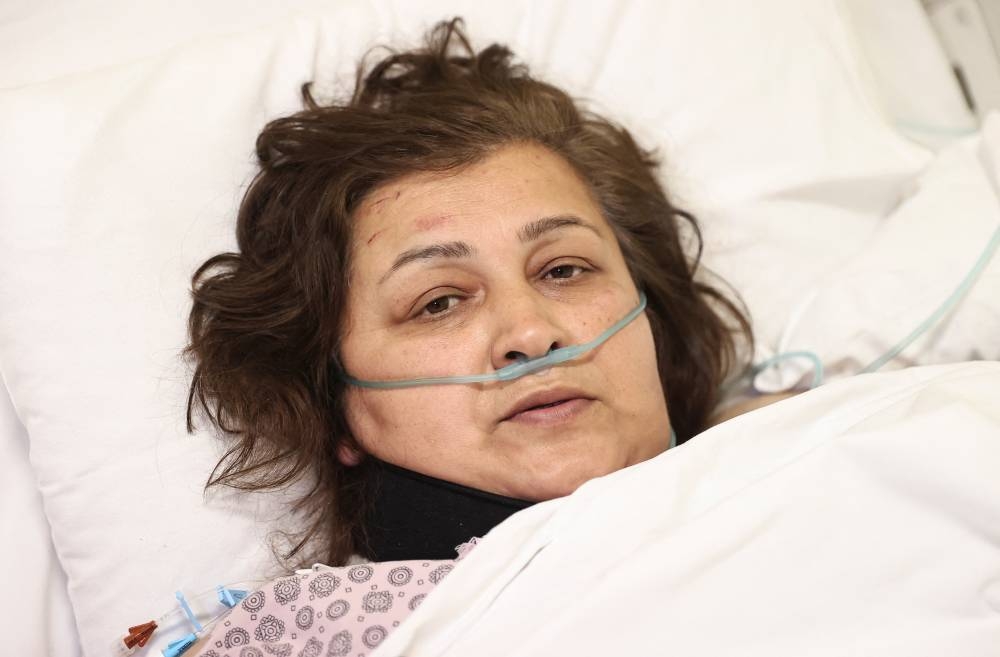 Vafa Shabanova, a passenger on the Azerbaijan Airlines plane that crashed in Kazakhstan, receives treatment at a hospital in Baku, Azerbaijan, December 27, 2024. REUTERS/Aziz Karimov