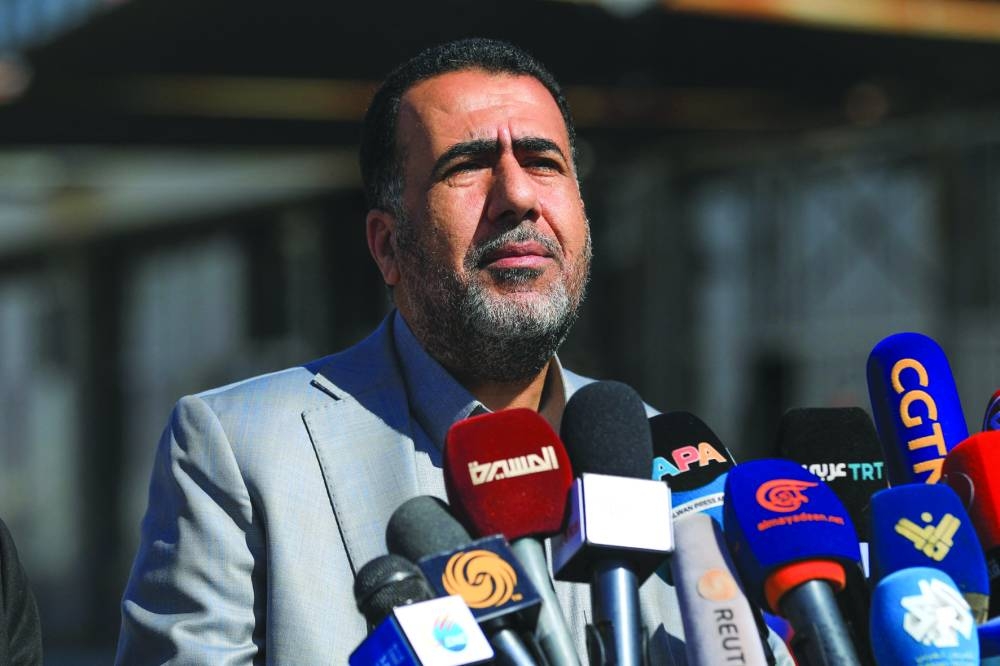 Yemen's Deputy Transport Minister Yahya al-Sayani delivers a statement at Sanaa international airport, yesterday.