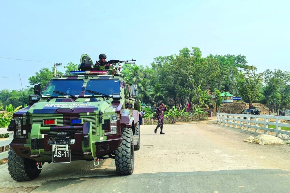 
Border Guard Bangladesh personnel patrol near the Bangladesh’s Ukhia border in Cox’s Bazar in a file picture. 
