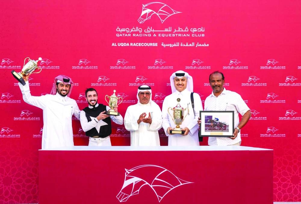 Team of Hazaa Al Shahania celebrates after the gelding won the End Of Year Cup at the Al Uqda Racecourse on Saturday. PICTURE: Juhaim