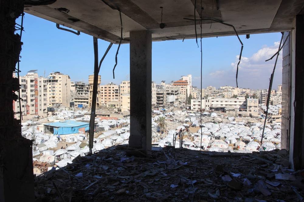 Tents housing displaced Palestinians in the central Gaza Strip on Sunday. AFP
