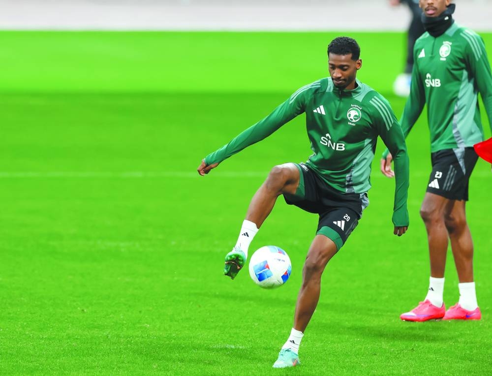 Saudi Arabia’s Abdullah Radif trains on Monday, on the eve of the Arabian Gulf Cup semi-final against Oman.