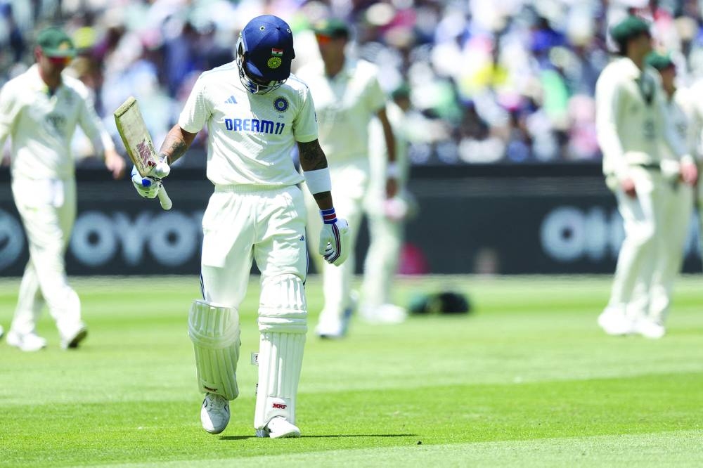 India’s Virat Kohli leave the field after being dismissed on day five of the fourth Test against Australia at the MCG. (AFP)