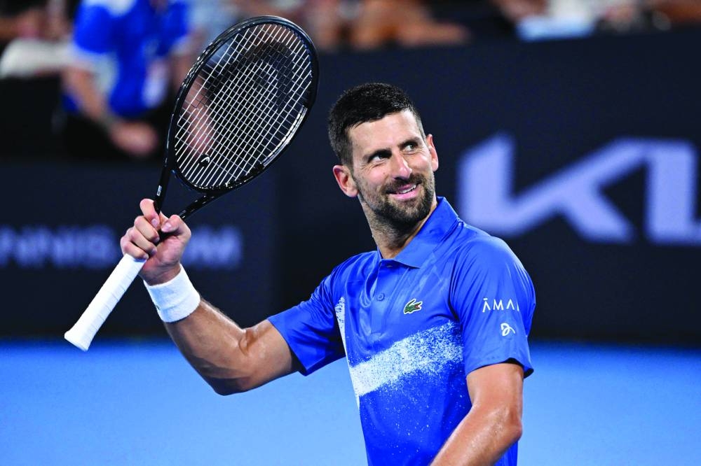 Novak Djokovic of Serbia celebrates winning his match against Australia’s Rinky Hijikata at the Brisbane International in Brisbane on Tuesday. (AFP)
