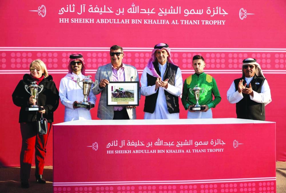 
Team Ilasad celebrates after the six-year-old won the Majd Al Arab Sprinter Championship. 