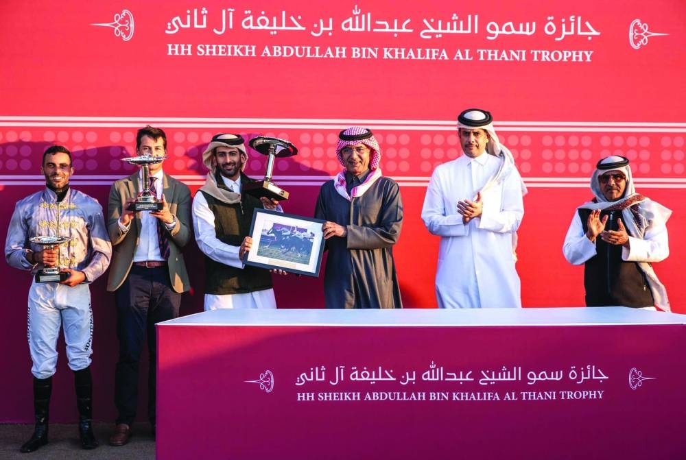 His Highness Sheikh Abdullah bin Khalifa al-Thani awarded the connections of Al Mirage after the horse won the HH Sheikh Abdullah Bin Khalifa Al Thani Trophy at the Al Rayyan Racecourse on Thursday. PICTURES: Juhaim